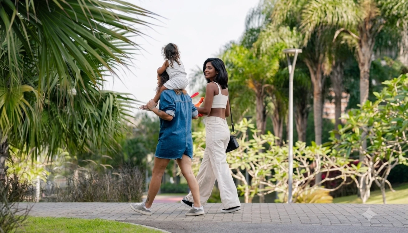 Family walking along a landscaped path