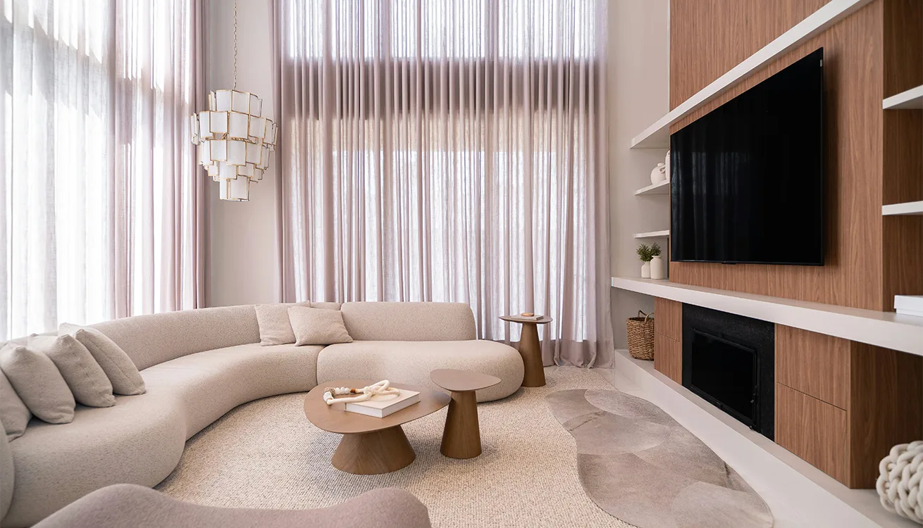 Contemporary family room with curved seating